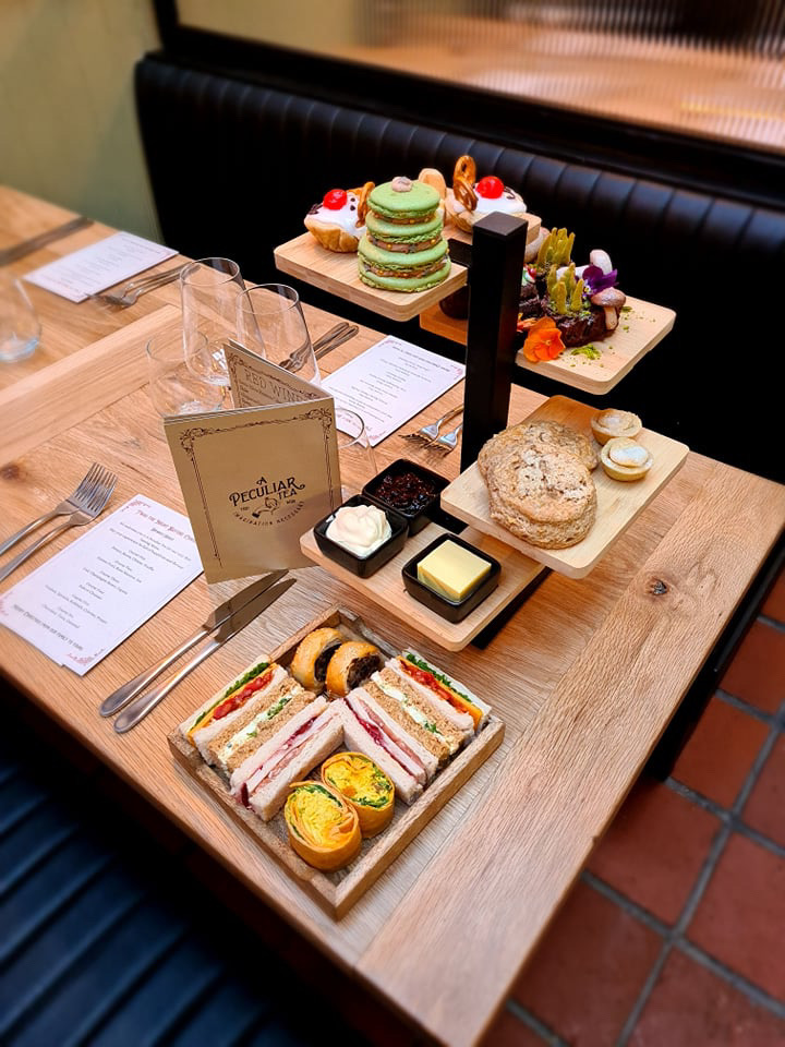 A Peculiar Tea afternoon tea set up